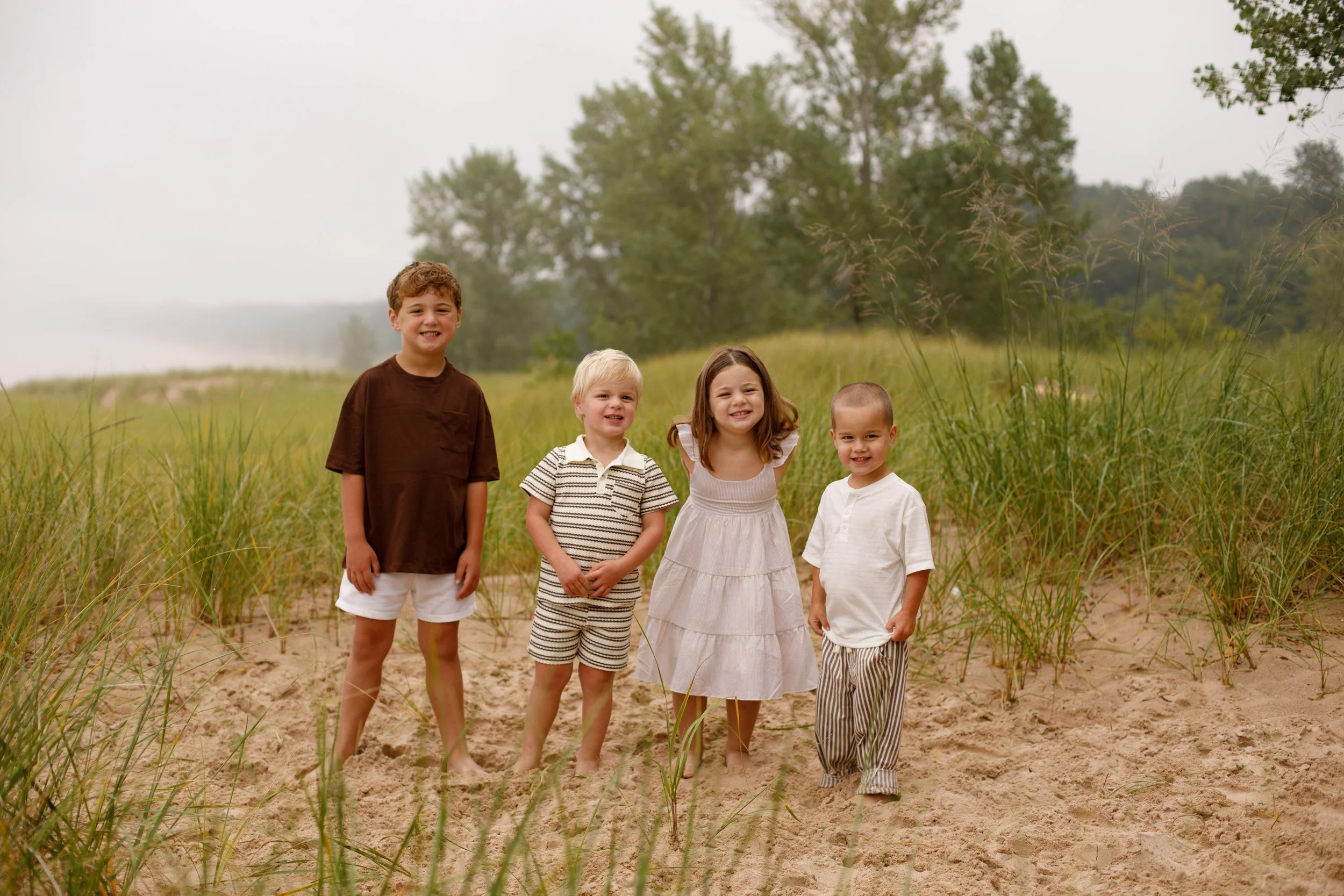 JessicaMax-michigan-family-photographer-pentwater-extended-family-session-documentary-sunrise-102.jpg