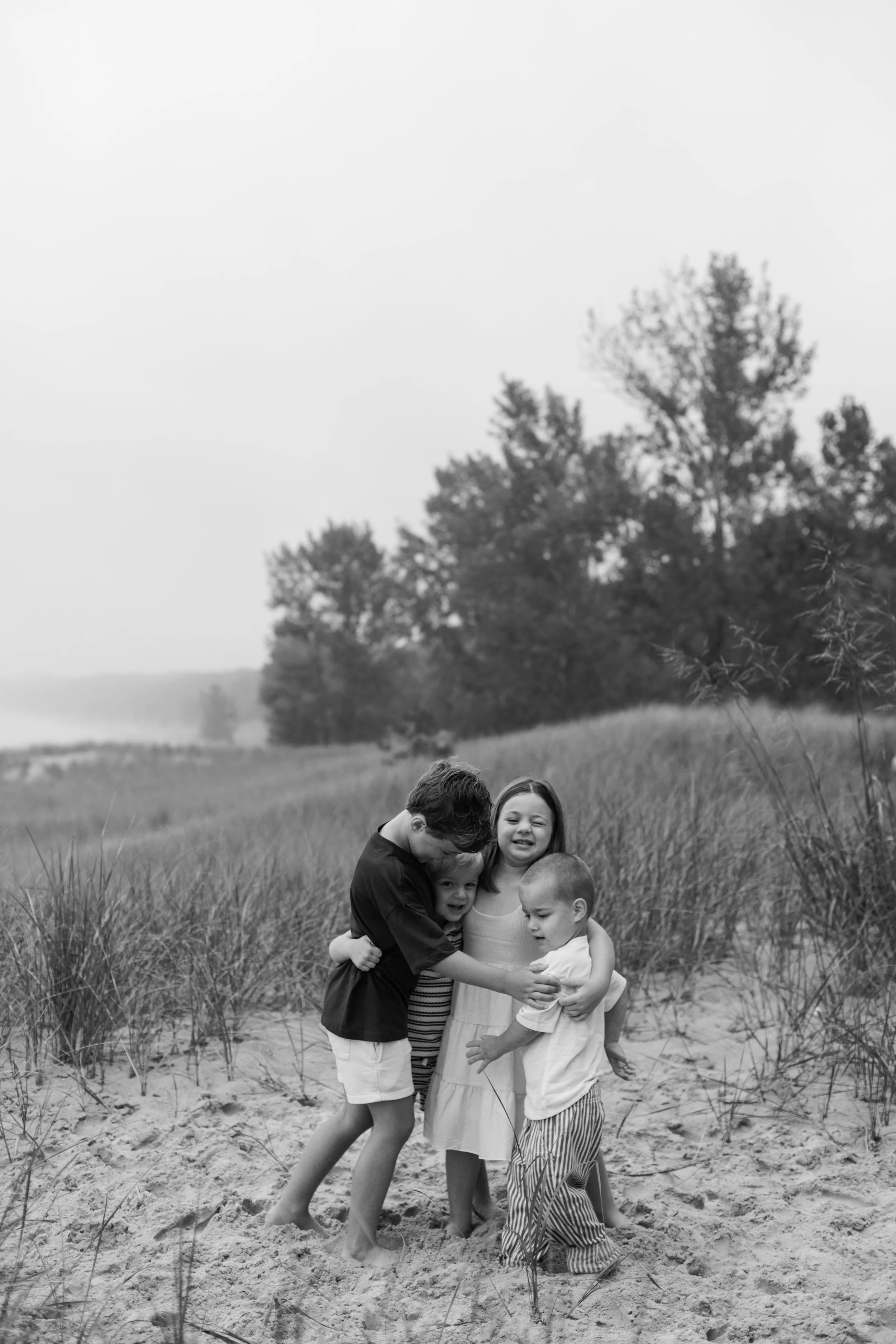 JessicaMax-michigan-family-photographer-pentwater-extended-family-session-documentary-sunrise-105.jpg