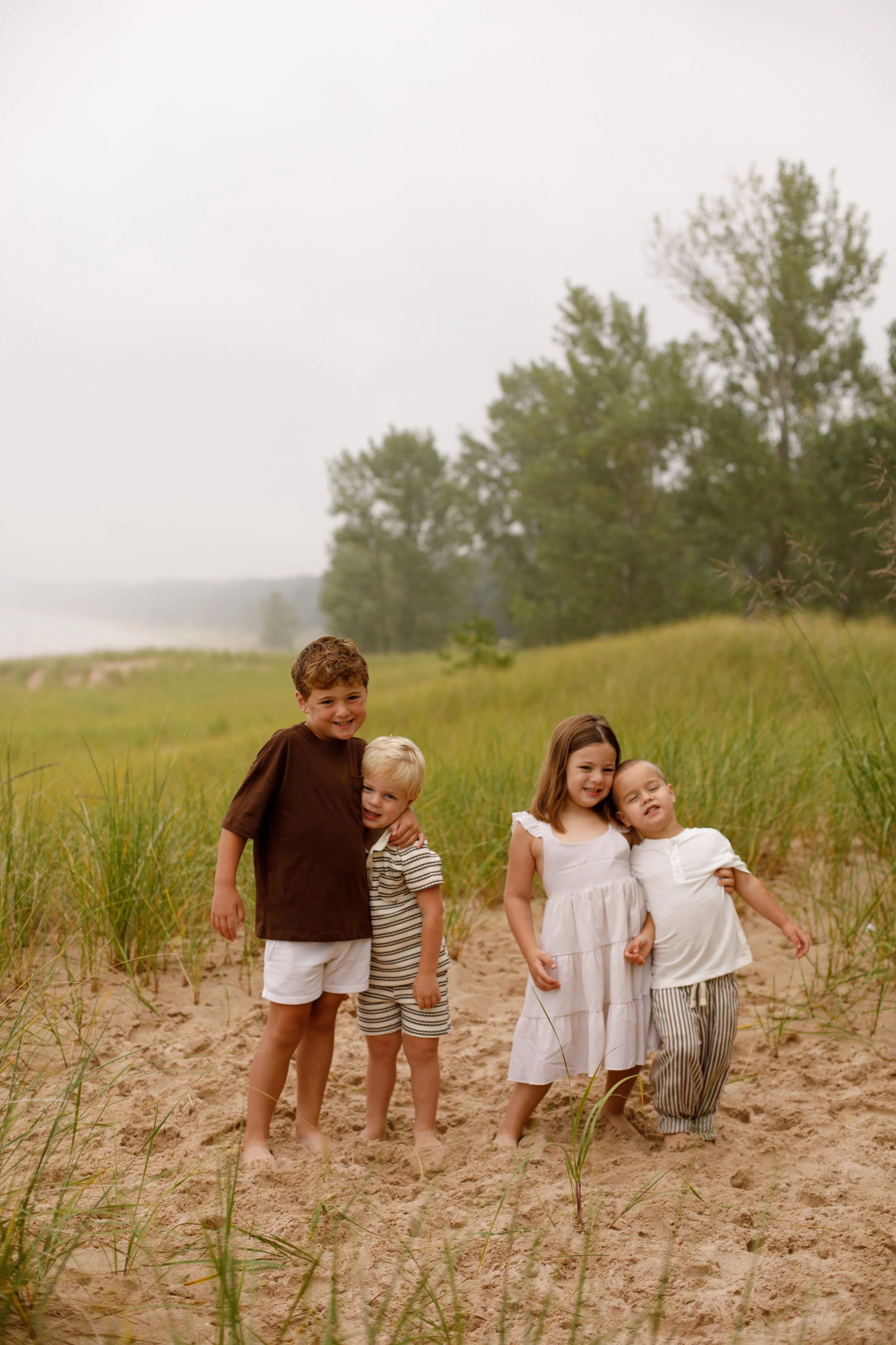 JessicaMax-michigan-family-photographer-pentwater-extended-family-session-documentary-sunrise-107.jpg