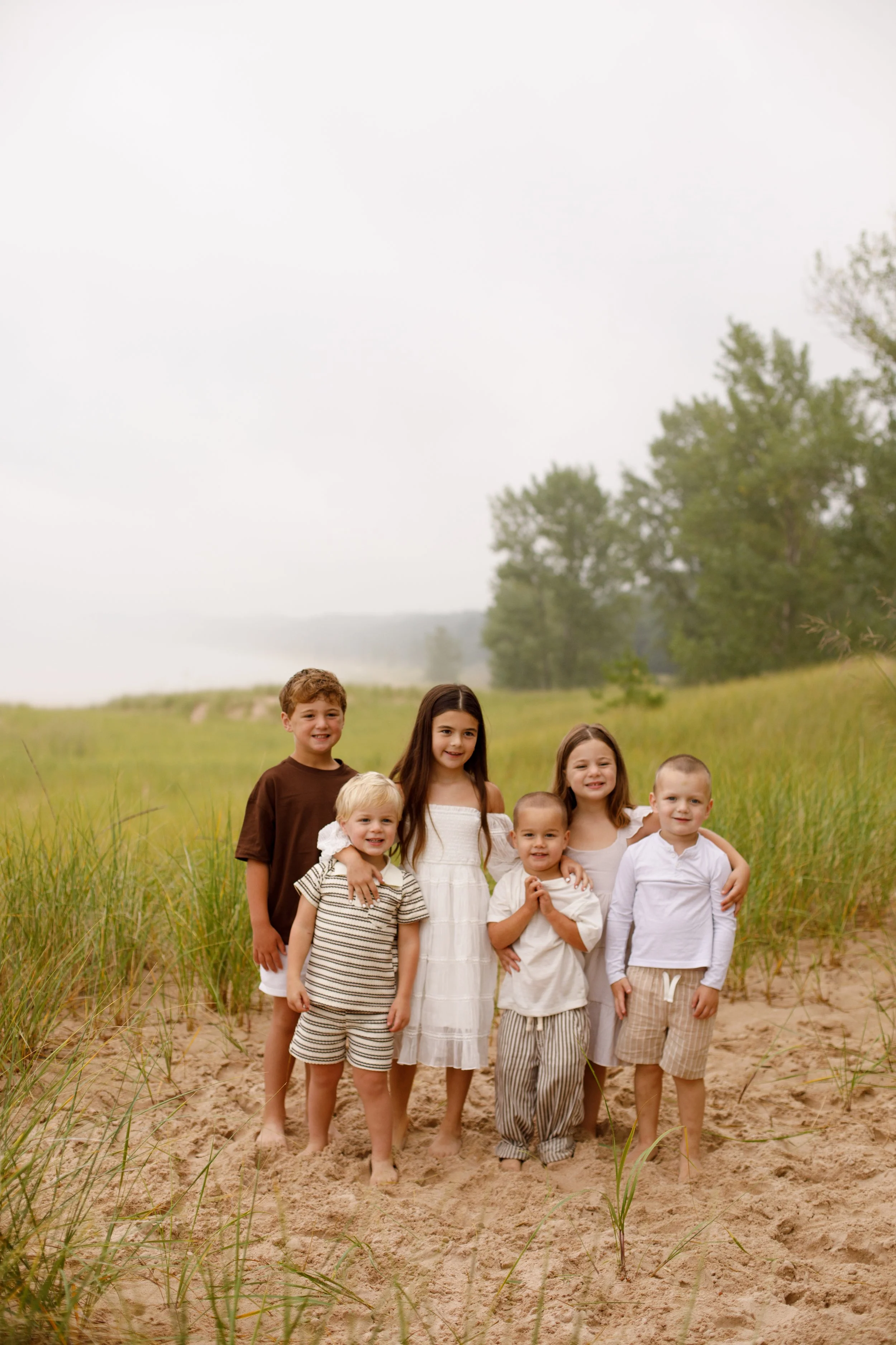 JessicaMax-michigan-family-photographer-pentwater-extended-family-session-documentary-sunrise-110.jpg
