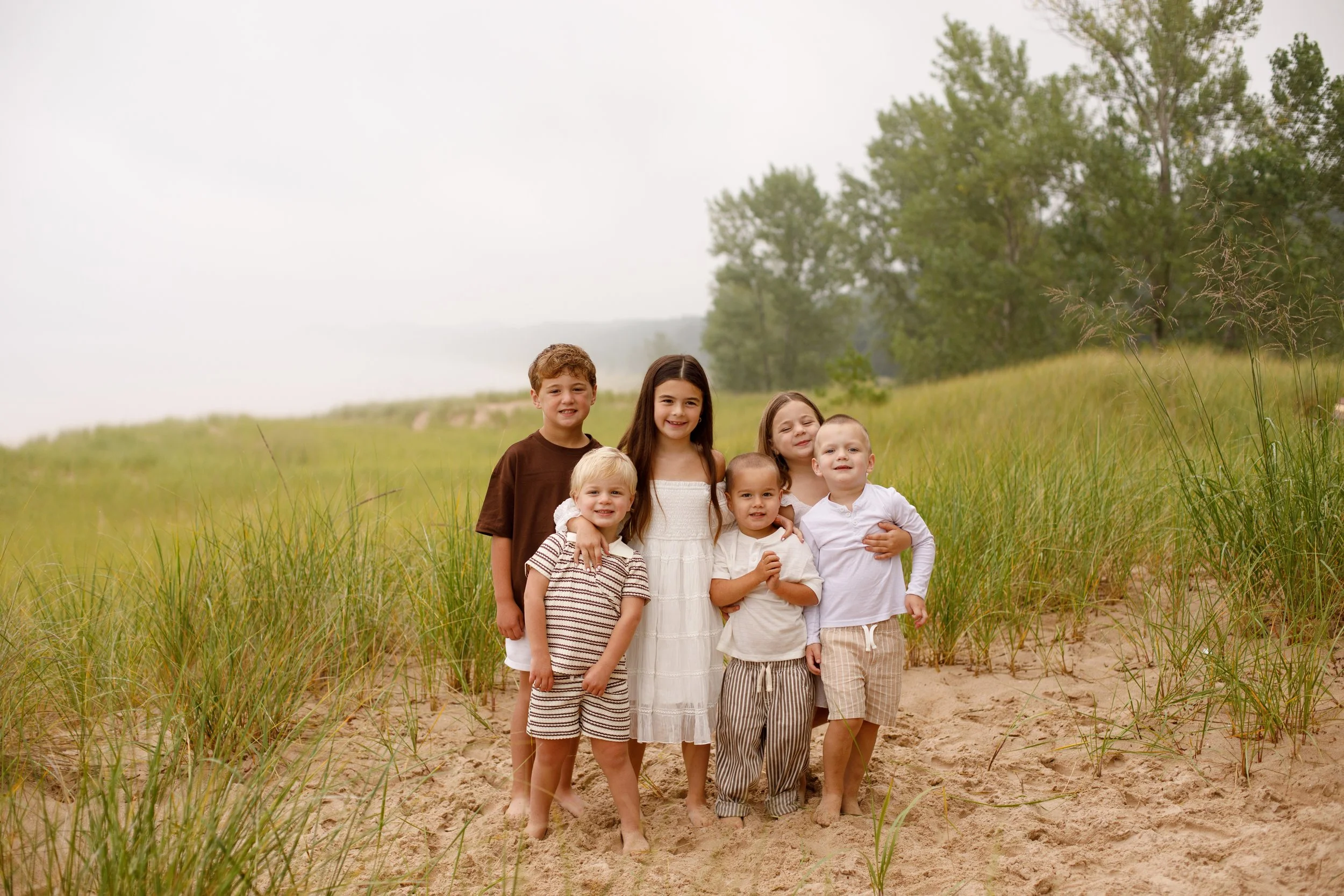 JessicaMax-michigan-family-photographer-pentwater-extended-family-session-documentary-sunrise-114.jpg