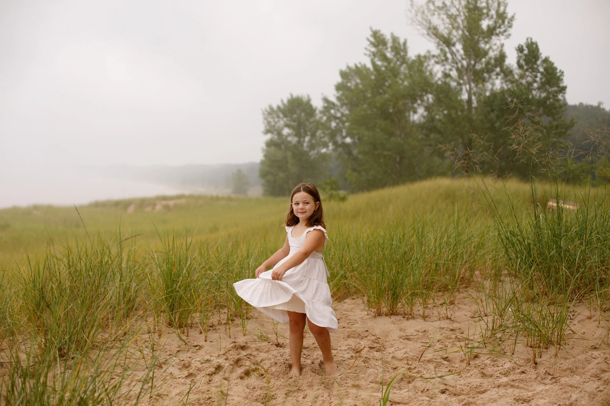 JessicaMax-michigan-family-photographer-pentwater-extended-family-session-documentary-sunrise-123.jpg