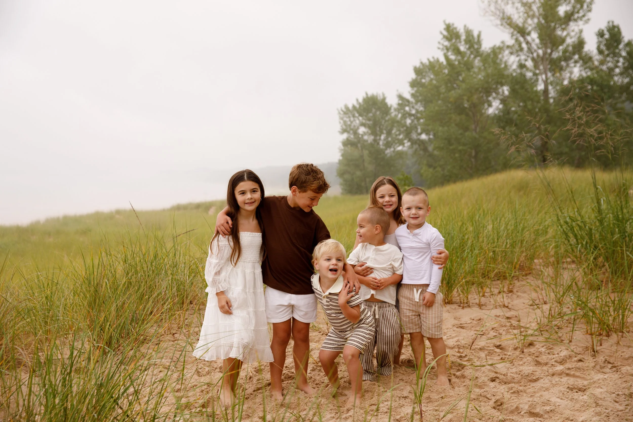 JessicaMax-michigan-family-photographer-pentwater-extended-family-session-documentary-sunrise-138.jpg
