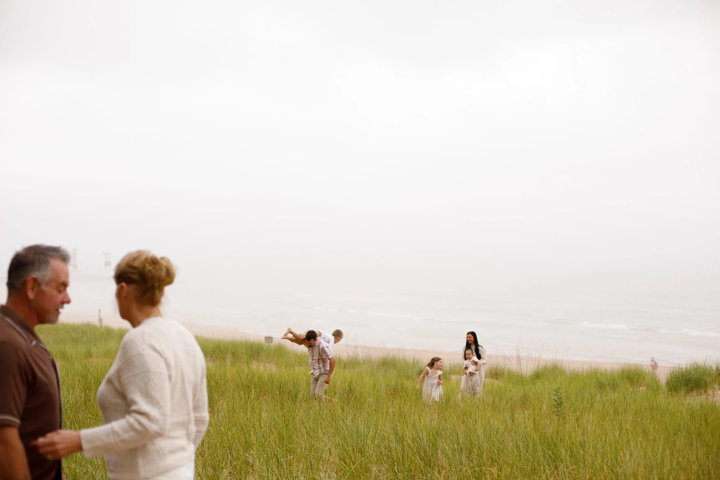 JessicaMax-michigan-family-photographer-pentwater-extended-family-session-documentary-sunrise-147.jpg