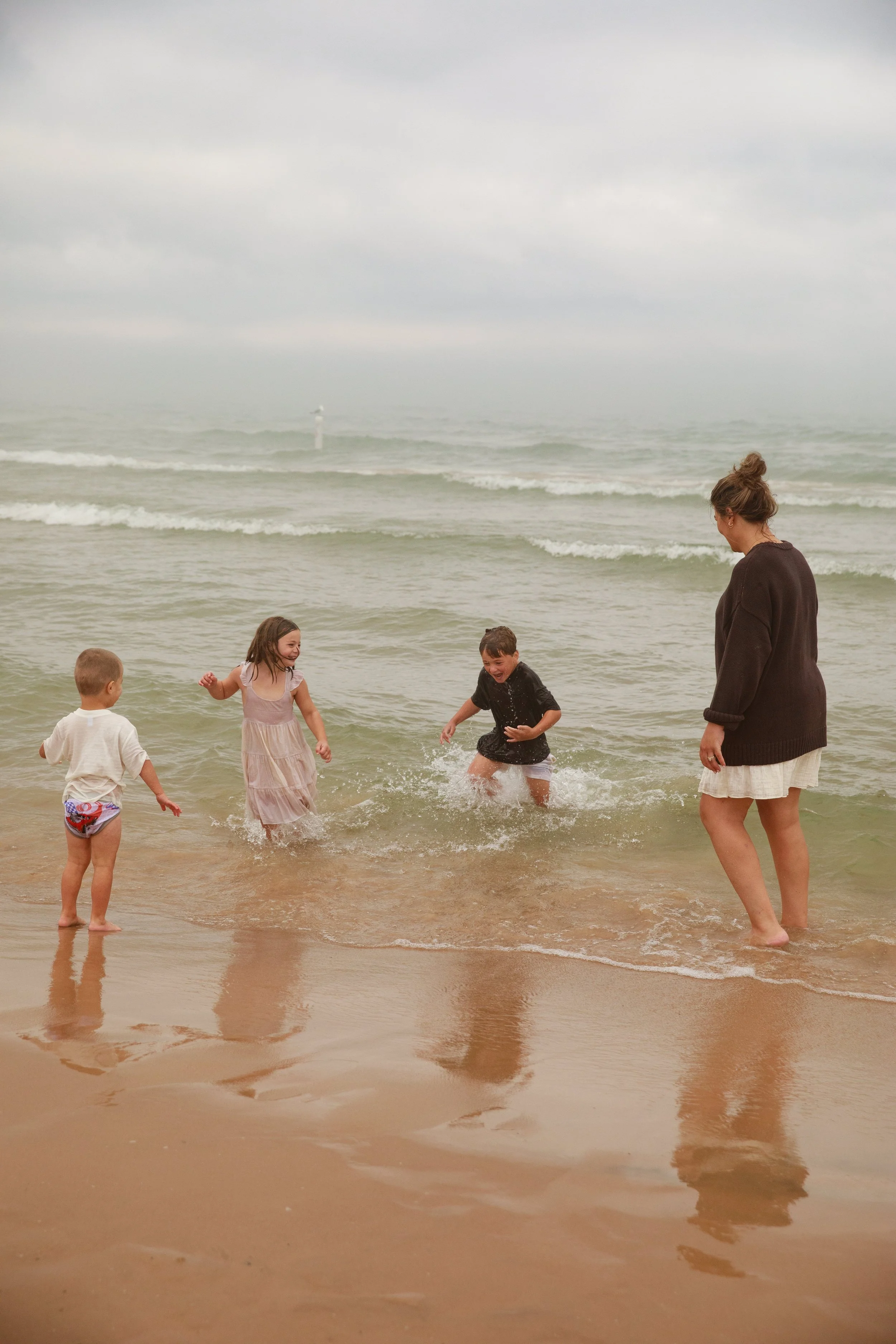 JessicaMax-michigan-family-photographer-pentwater-extended-family-session-documentary-sunrise-332.jpg