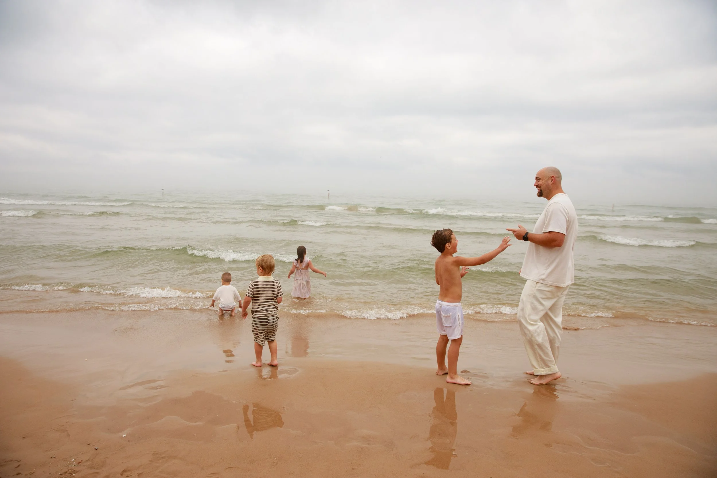 JessicaMax-michigan-family-photographer-pentwater-extended-family-session-documentary-sunrise-355.jpg