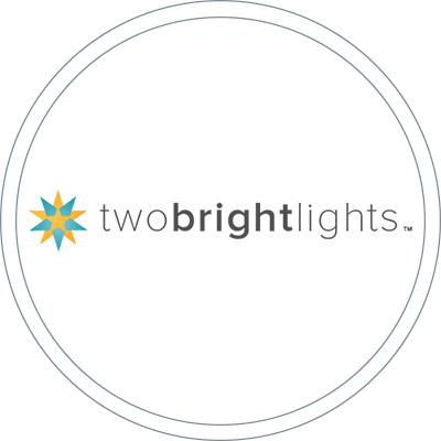 TwoBrightLightsBadge.png