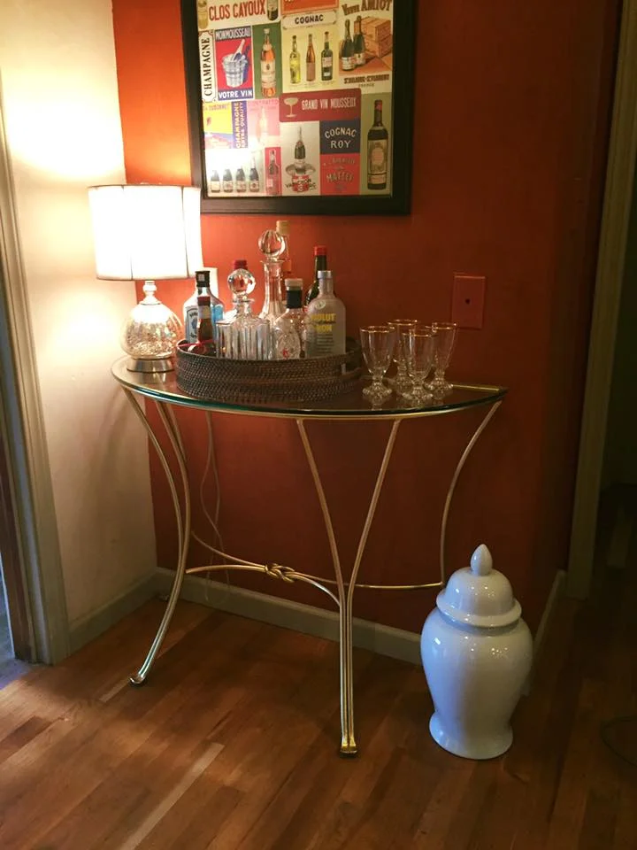 I painted an old table I had as my bar gold and I LOVE it!