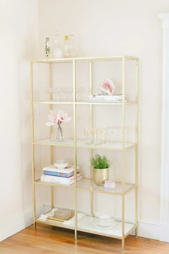 Cannot go wrong with a gold bookcase!