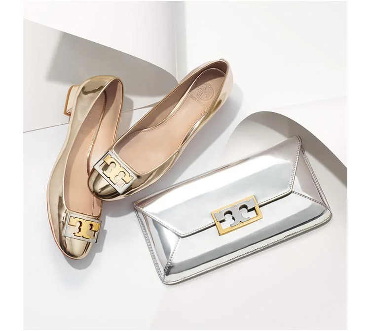 Tory Burch need I say more? I got these shoes in burgundy but I LOVE the gold!