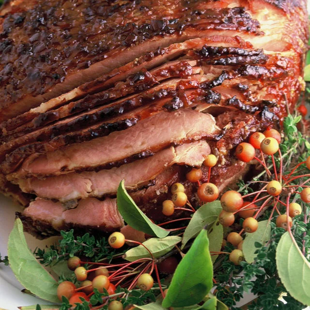 Baked Virginia Ham . I have made this ham so many times but it never disappoints. Serve with cheesy hash brown potatoes, and a layered pea salad and you have a winner, winner piggy dinner! Use the left over ham to make mac and cheese with ham later in the week. Wine paring: A Malbec is perfect for this meal. 