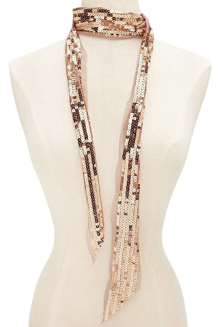 And for those of you who only want to dip your toe into the sparkle thing... Forever 21 Sequin Oblong Scarf $4.00 3 colors. OMG I can see this with so many outfits! 