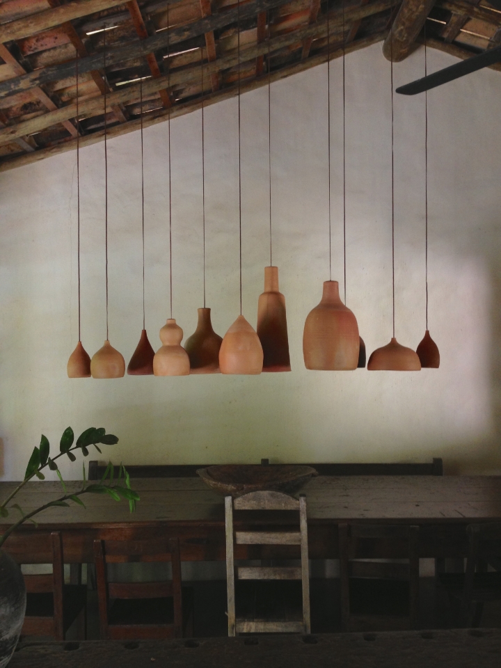 Handcrafted furniture and decorative touches adorn one of Uxua's dining spaces | photo by Maleeha Sambur