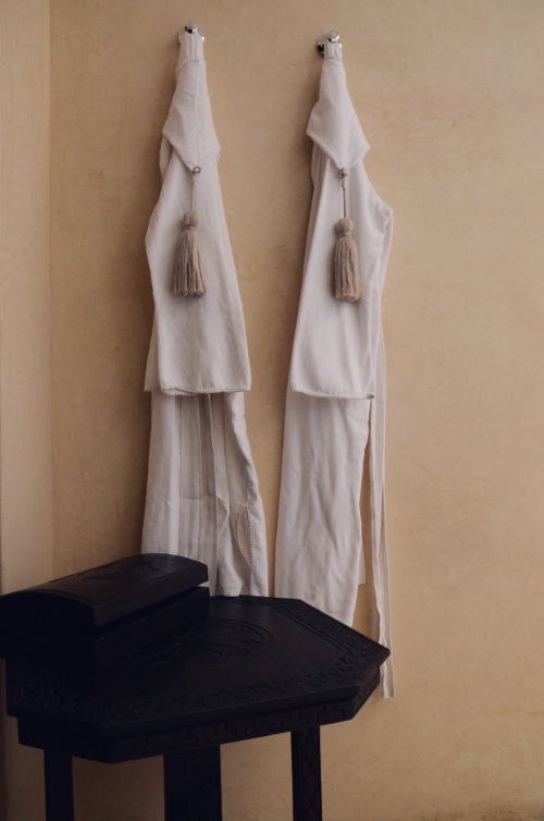 Robes hanging at Riad Dixneuf la Ksour | photo by Maleeha Sambur 