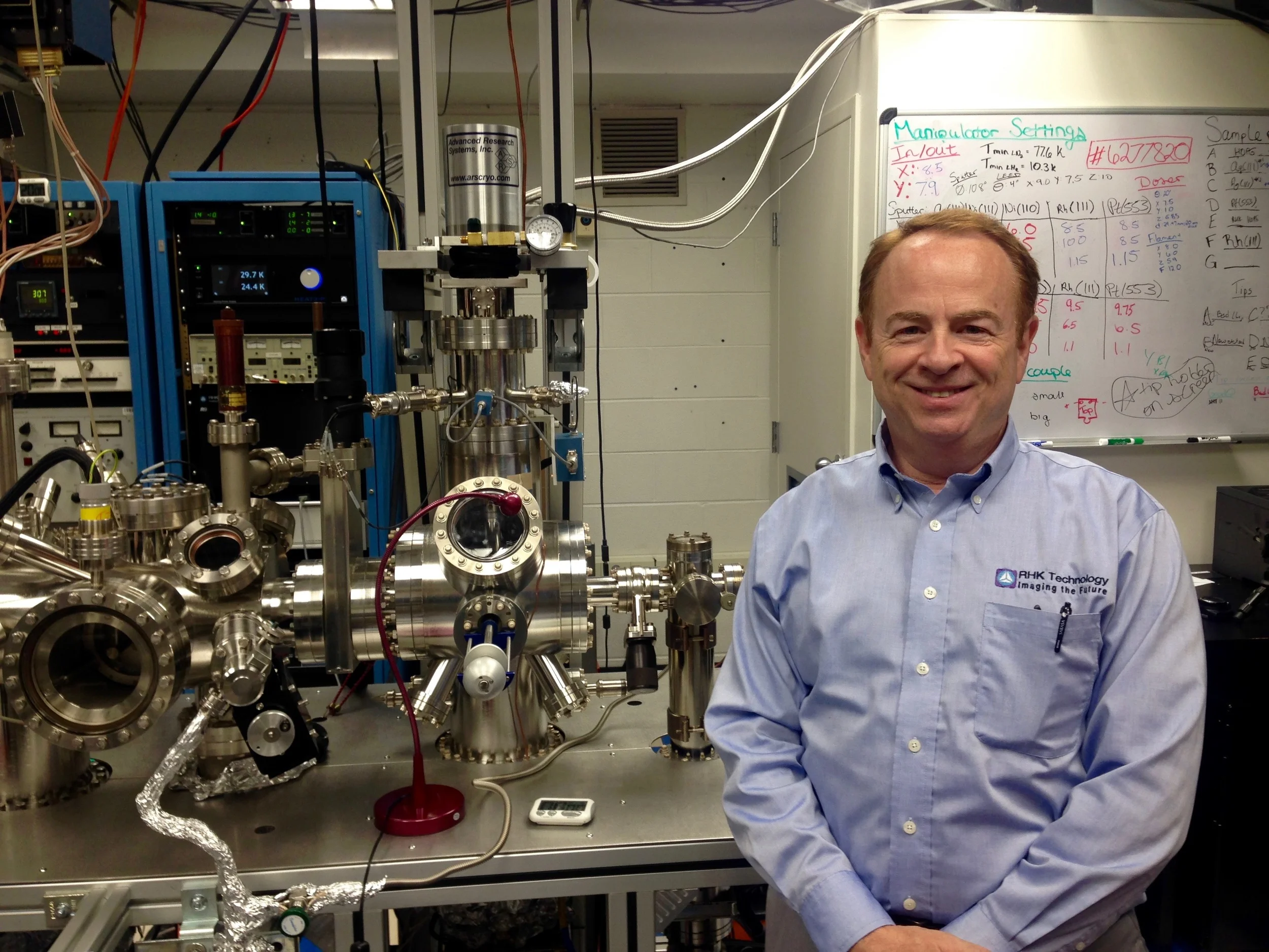 Adam Kollin, president of RHK Technology, visited the lab to see the ccHe STM in operation.