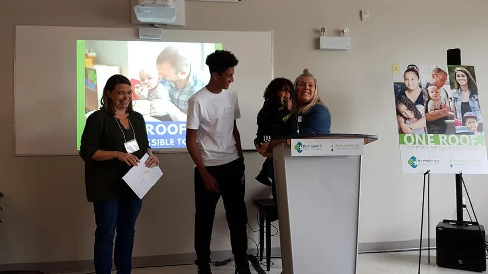 Diana shares her families’ story. From right to left: Diana, Dezmond, Kwame, and Andrea