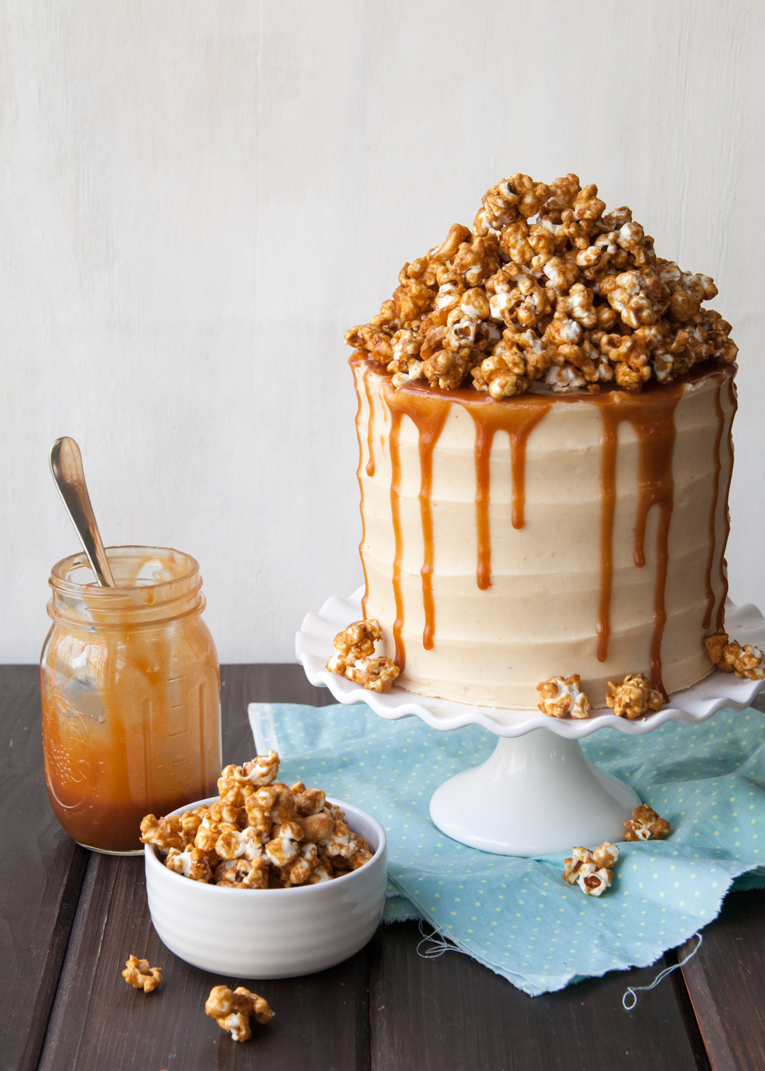 Caramel Popcorn Cake Recipe with brown butter cake and peanut butter frosting.