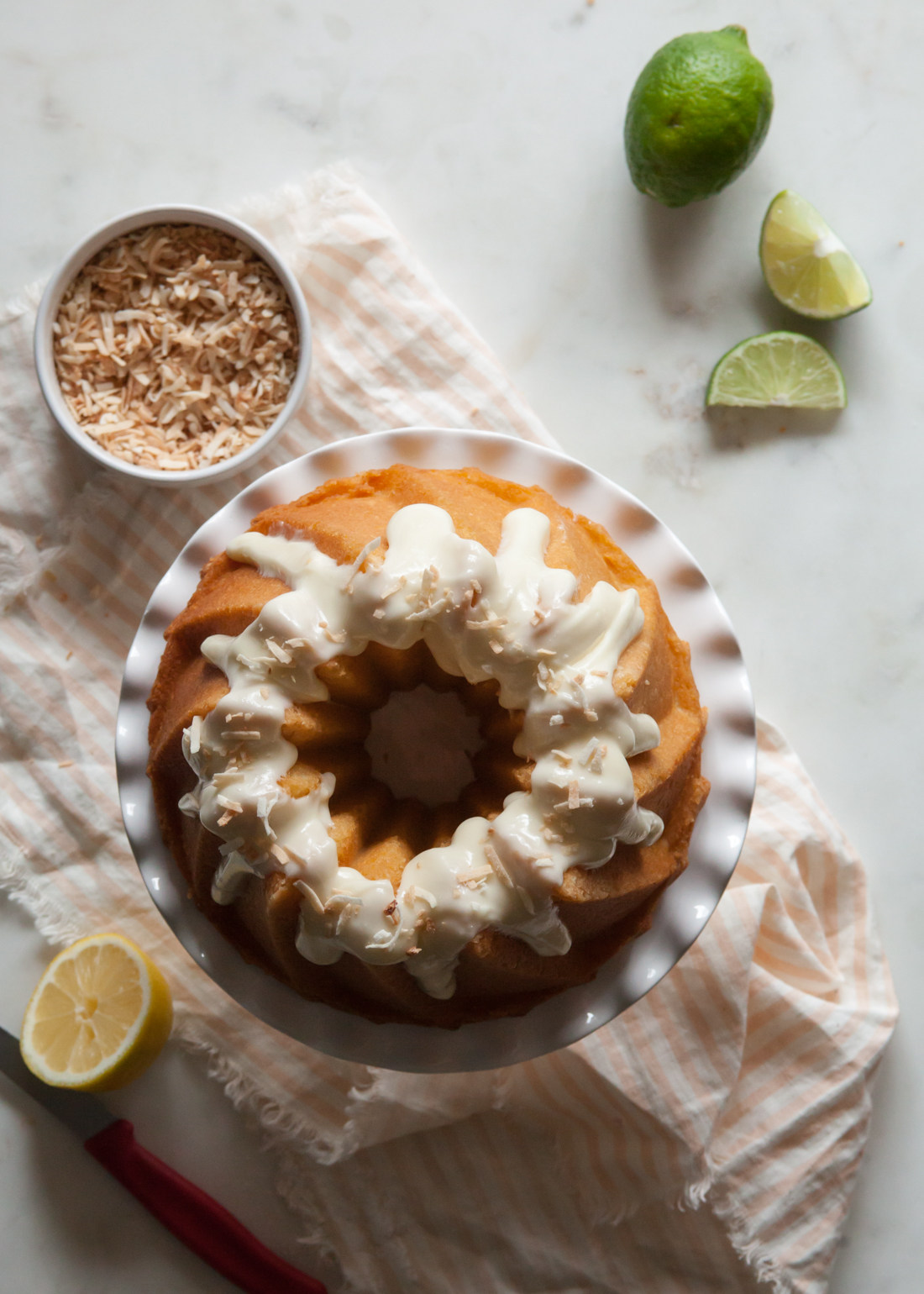 Citrus Bundt Cake with cream cheese glaze and toasted coconut.