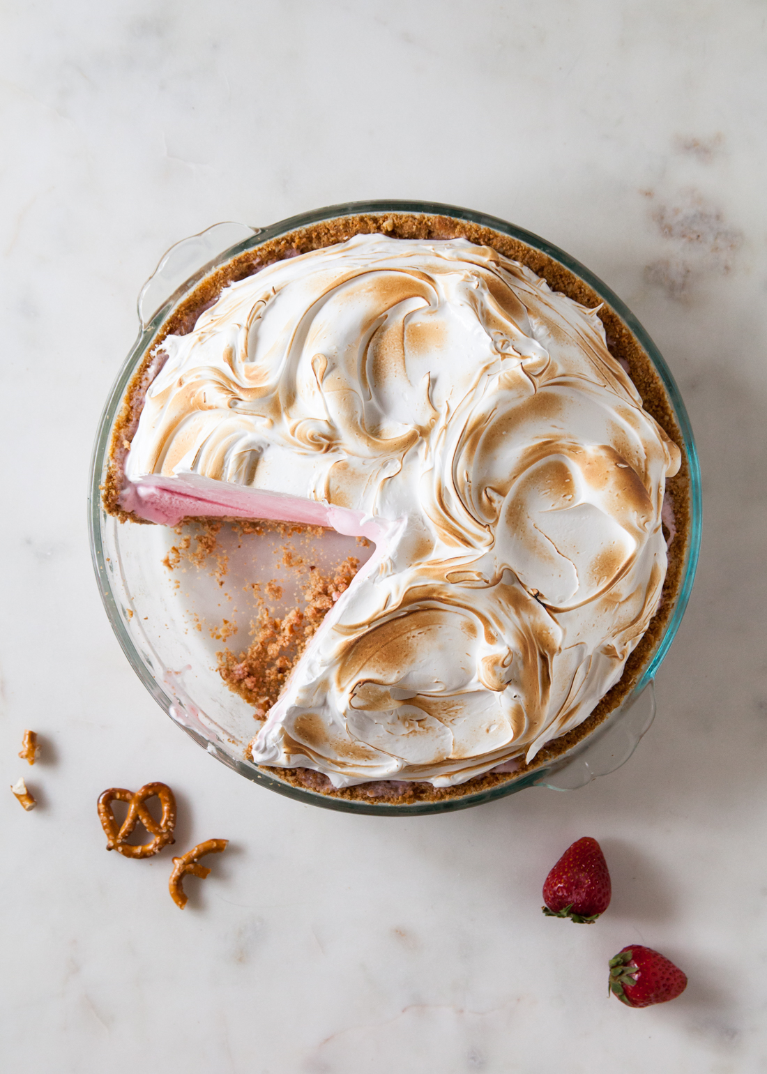 Baked Alaska Ice Cream Pie with a pretzel crusted and toasted meringue topping.
