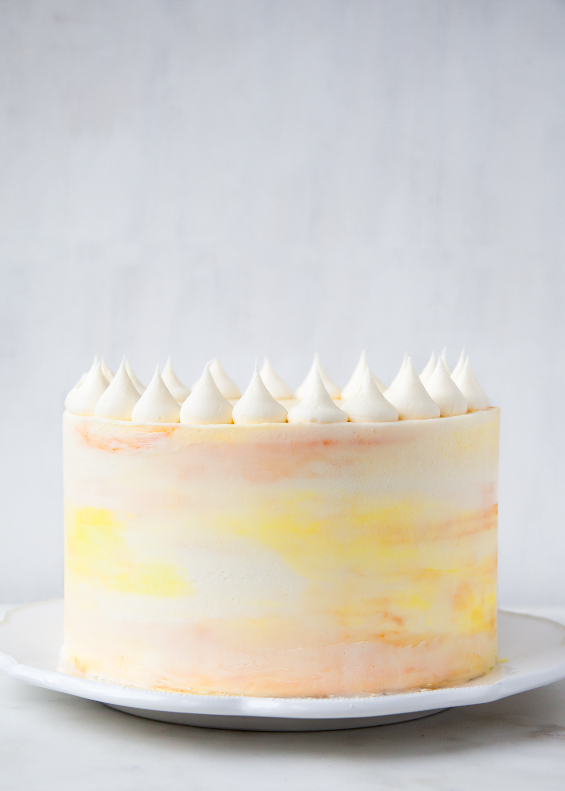 Passion fruit layer cake with coconut and cream cheese frosting.