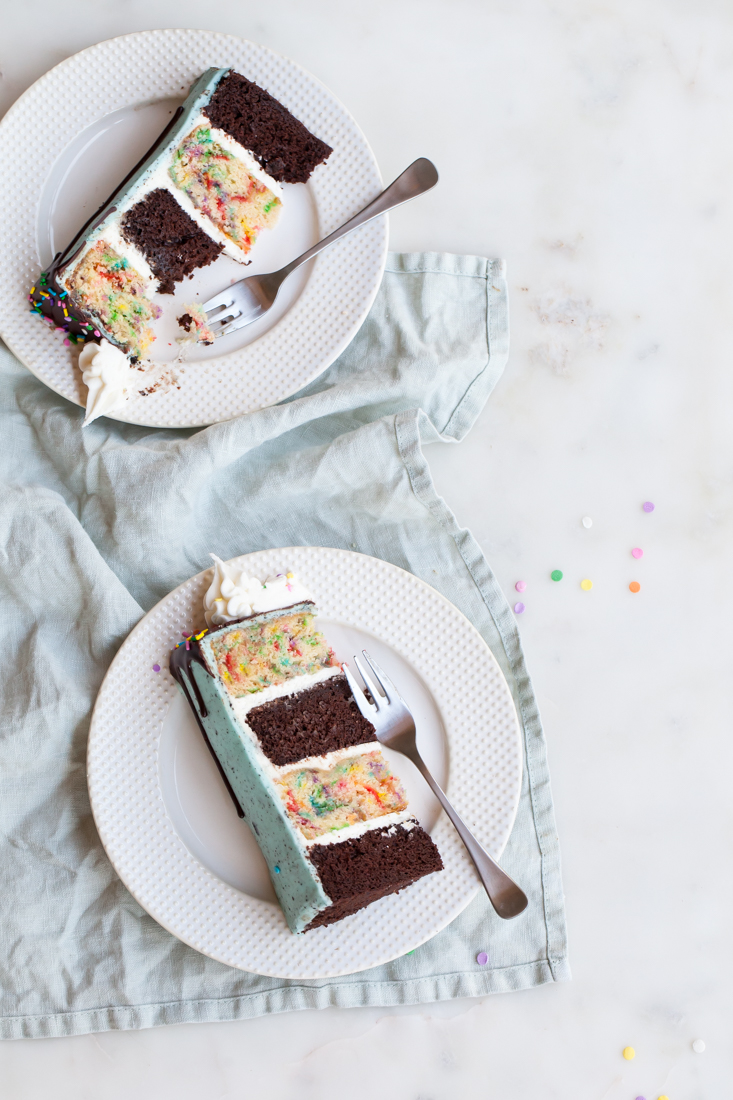 Birthday Oreo Cake with confetti cake, chocolate cake, and oreo frosting.