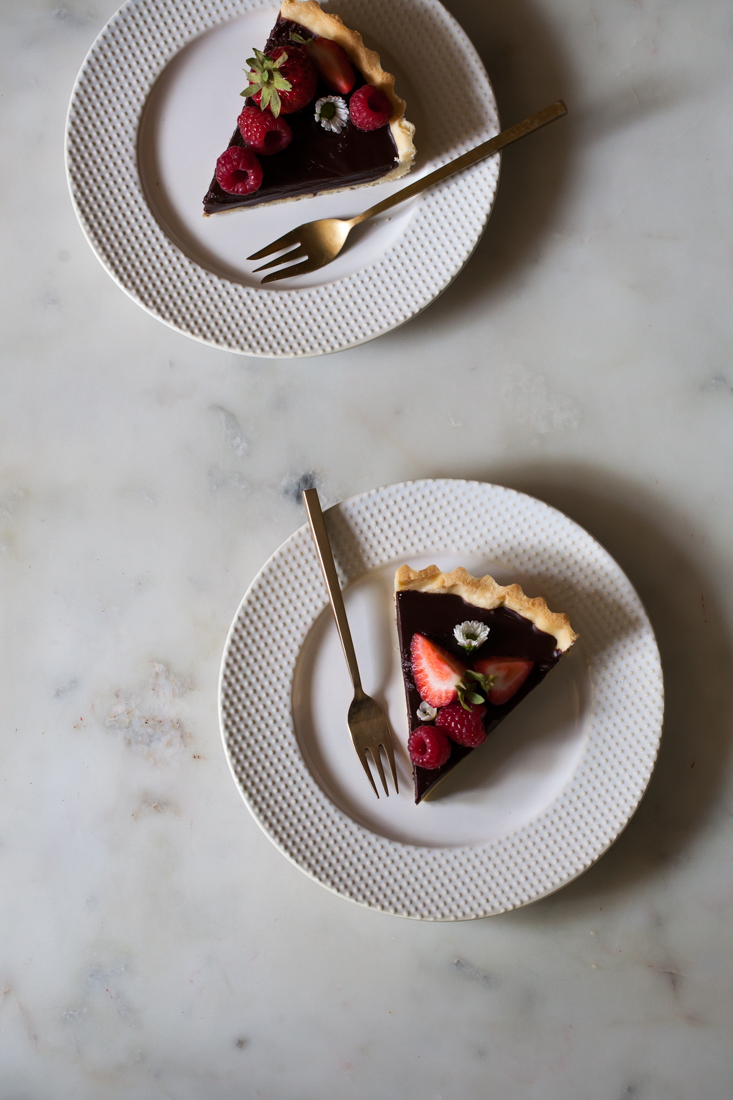 Chocolate Tart with buttery crust and berries.