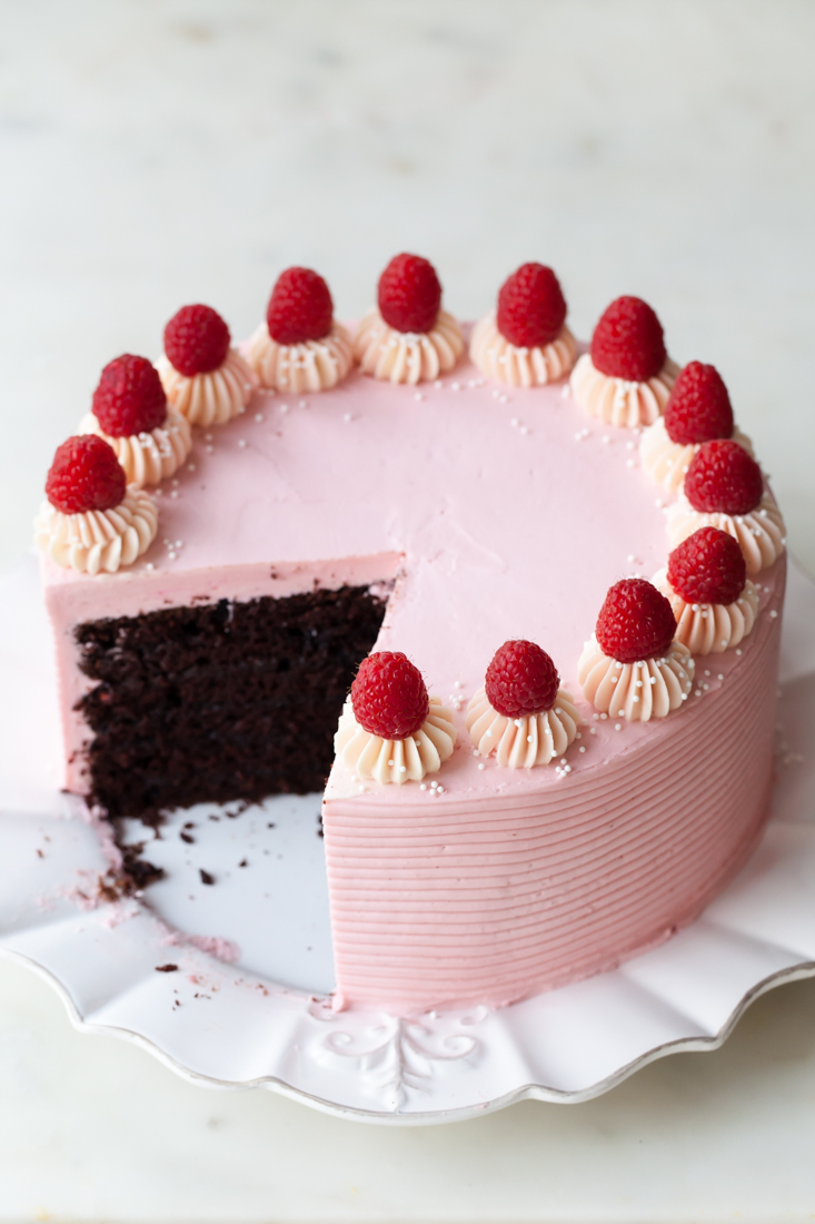 Chocolate Raspberry Layer Cake with jam and raspberry cheesecake buttercream.  Perfect for Valentine's Day!