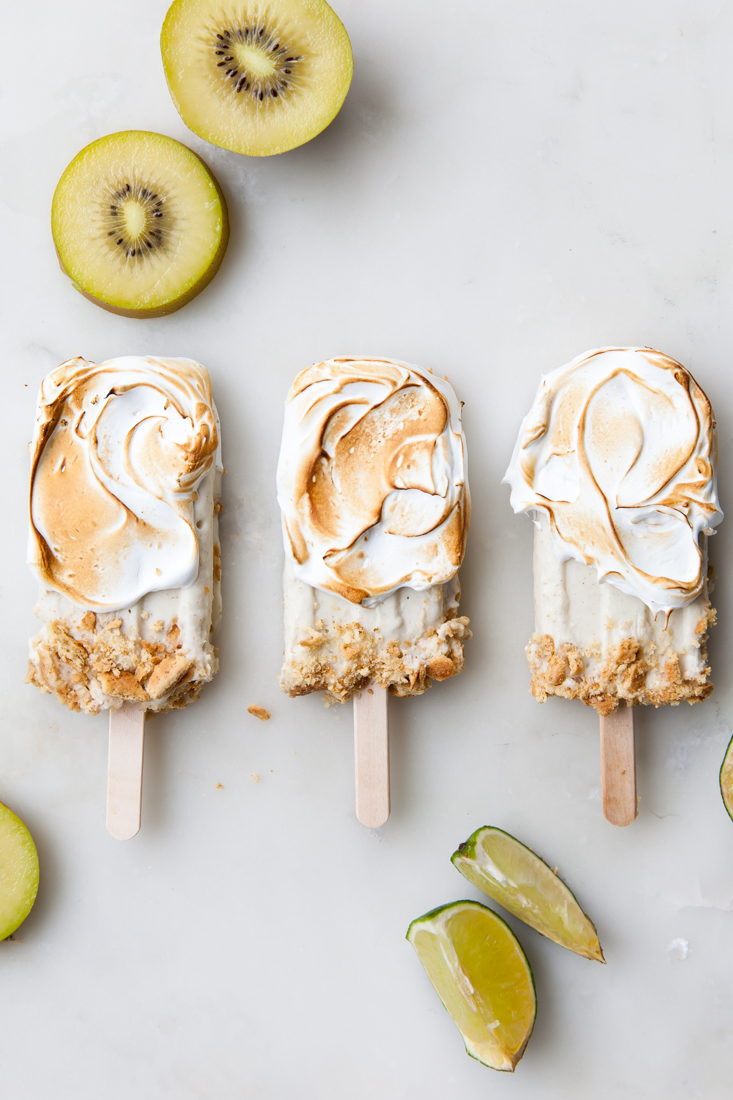 Kiwi Lime Pie Popsicles with torched meringue.  Non-dairy