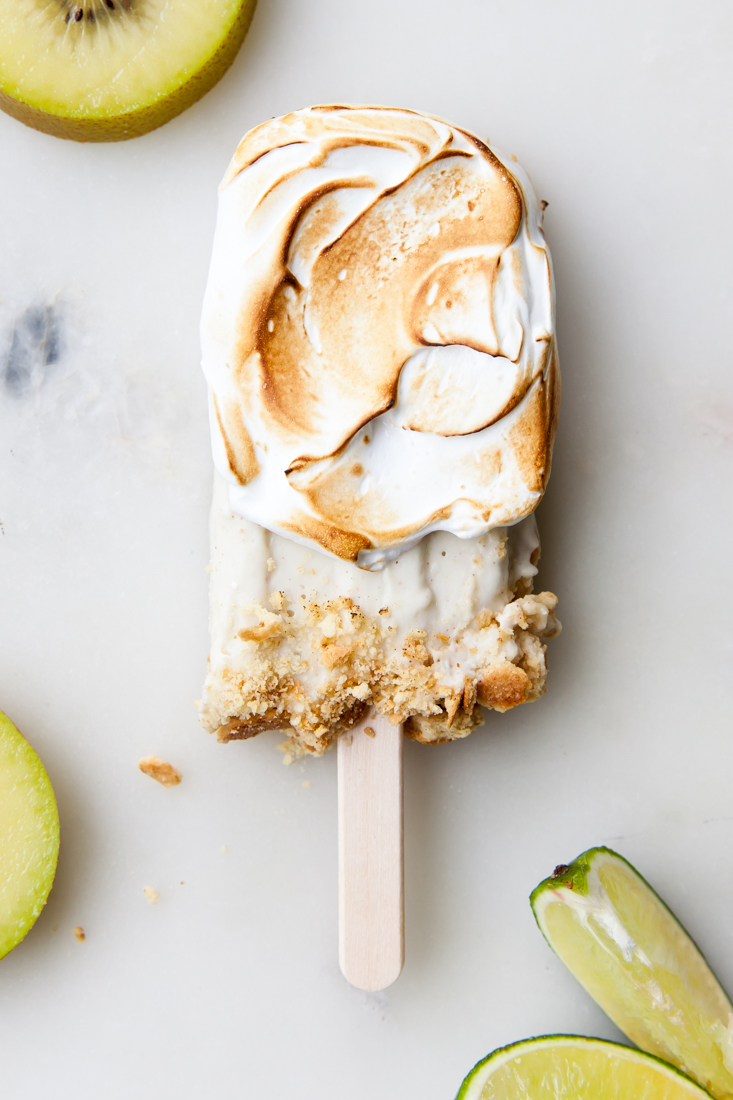 Kiwi Lime Pie Popsicles with torched meringue.  Non-dairy