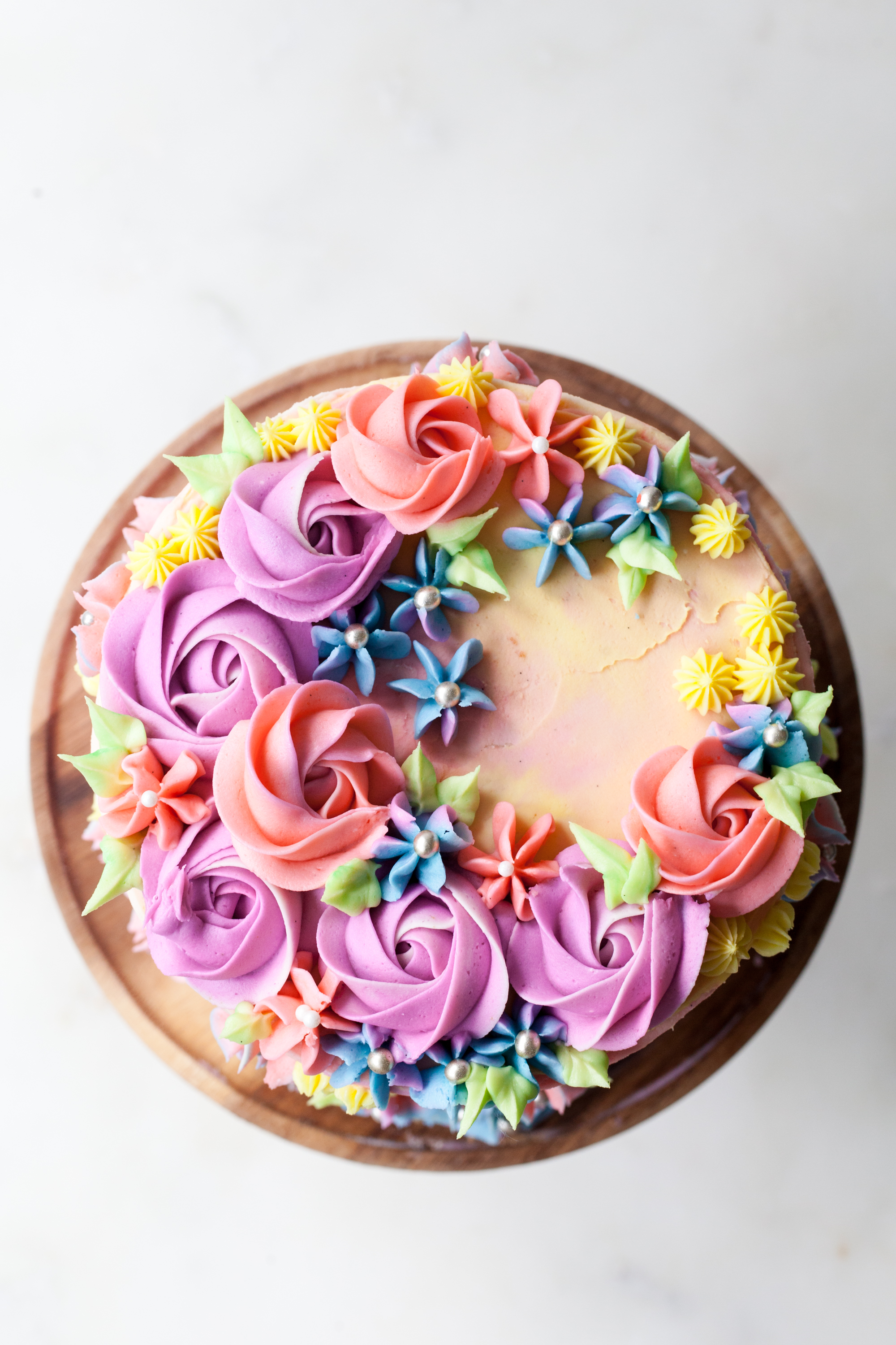 Sprinkle Birthday Cake with vanilla pastel buttercream swirls