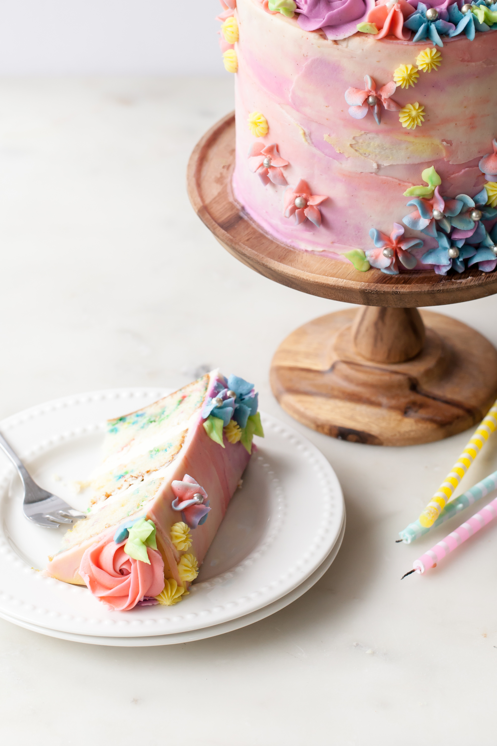 Sprinkle Birthday Cake with vanilla pastel buttercream swirls