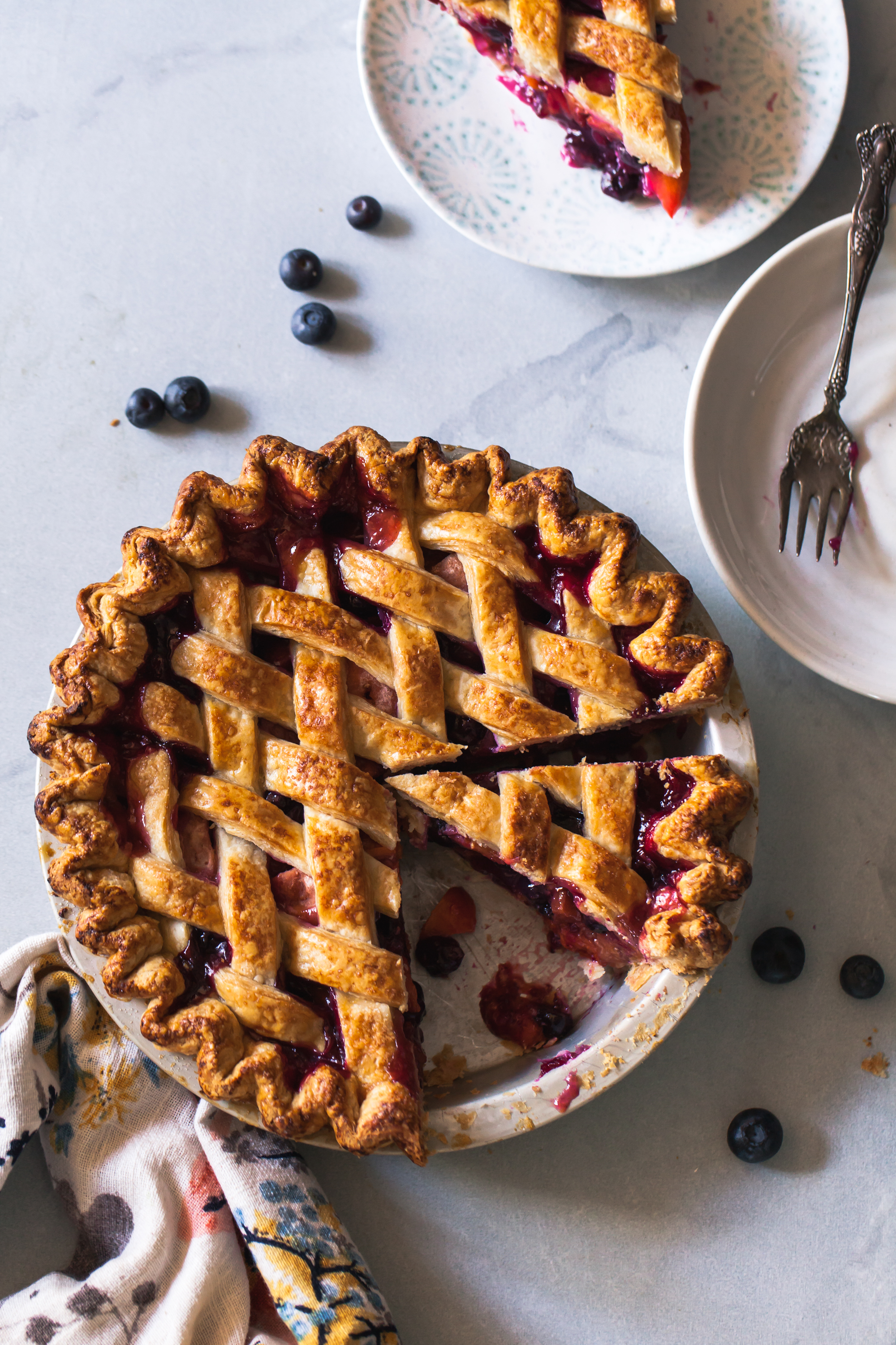 Blueberry Peach Pie Recipe with apricots and lattice crust.