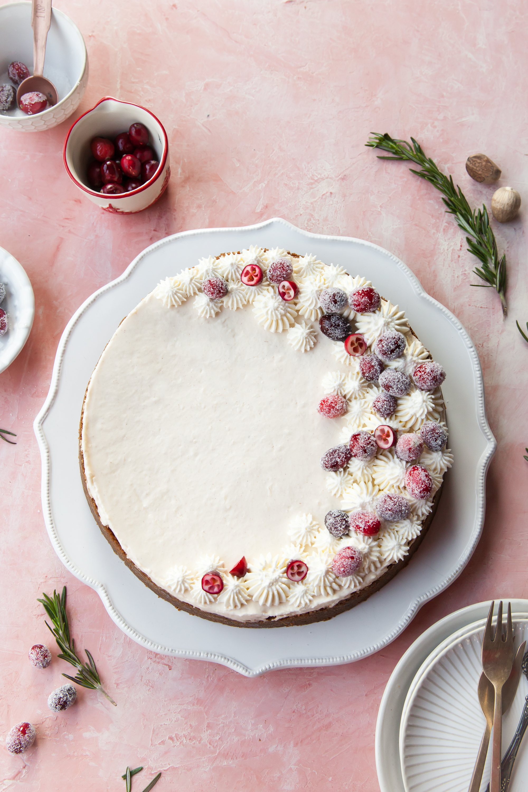 No-Bake Eggnog Cheesecake with sugared cranberries and gingersnap crust.