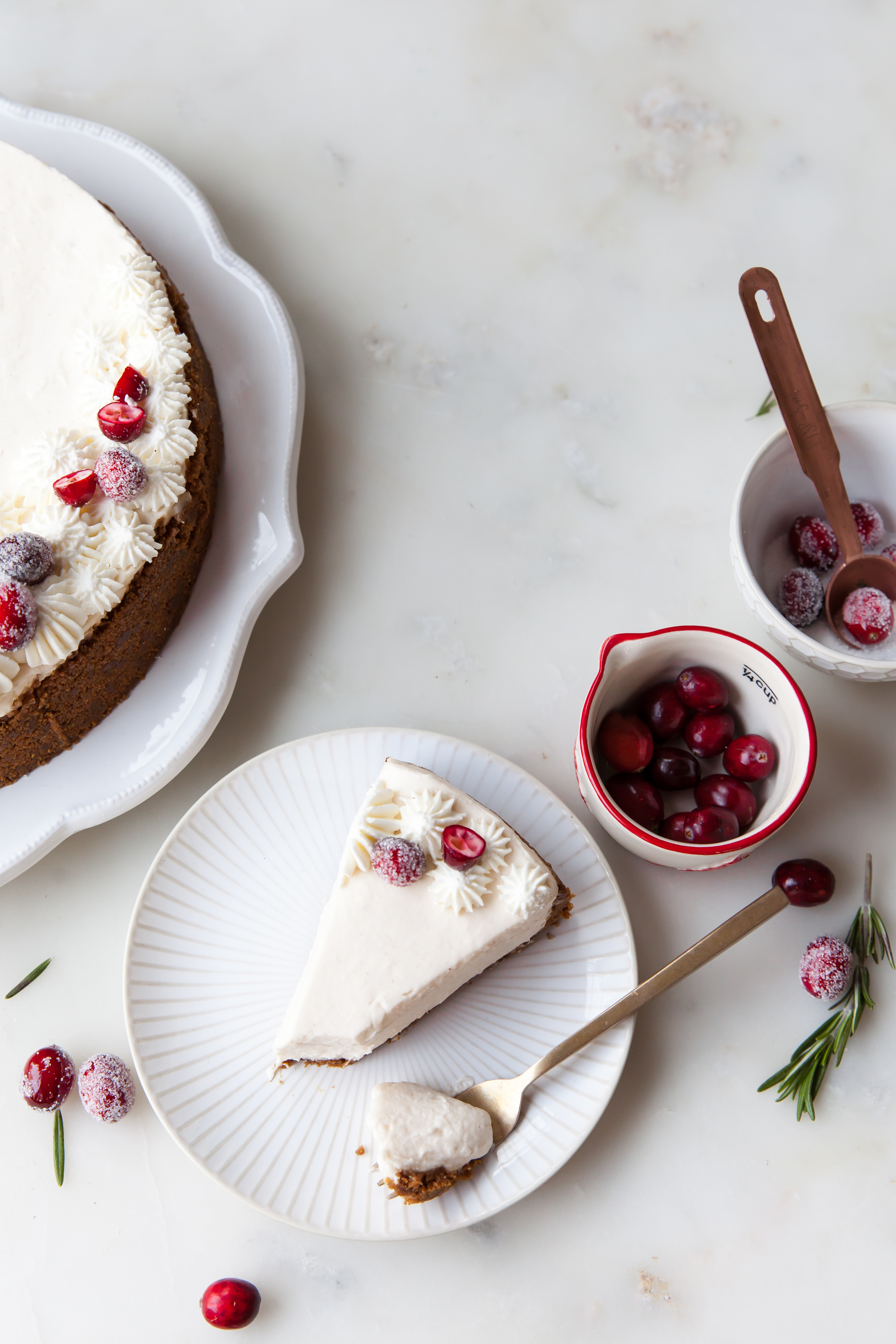 No-Bake Eggnog Cheesecake with sugared cranberries and gingersnap crust.