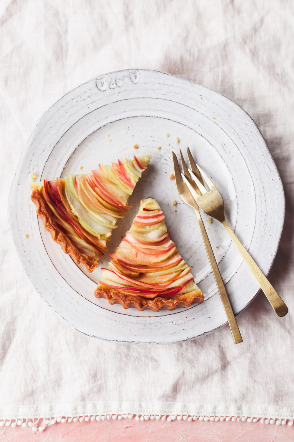 French apple tart slices with almond frangipane.