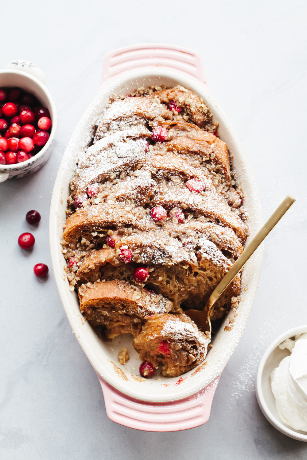 Overnight Gingerbread French Toast Recipe with cranberries, streusel, and whipped cream