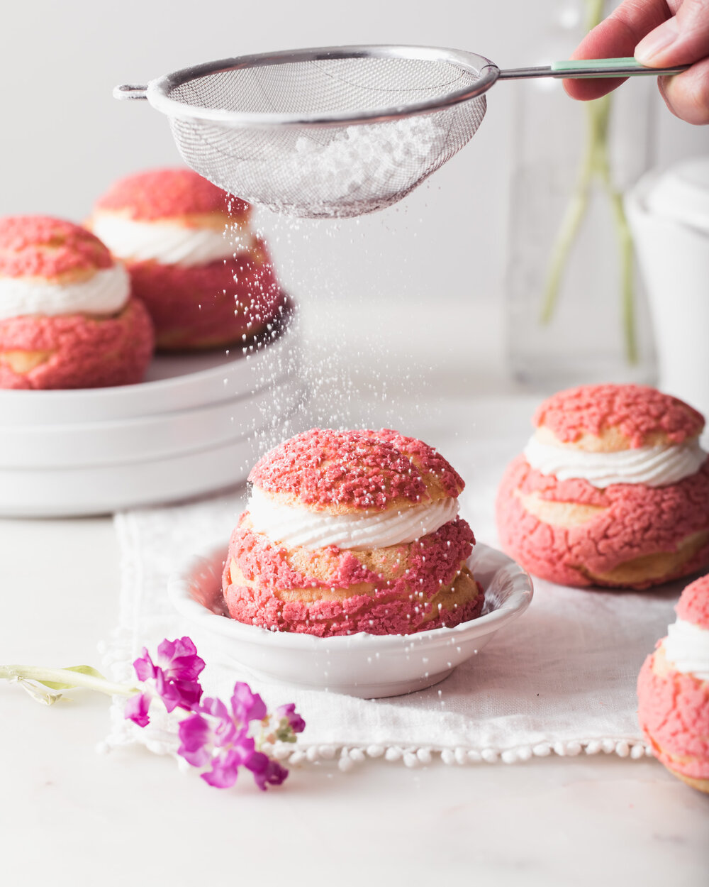 Raspberry Rose Choux Bun Recipe sifting powdered sugar