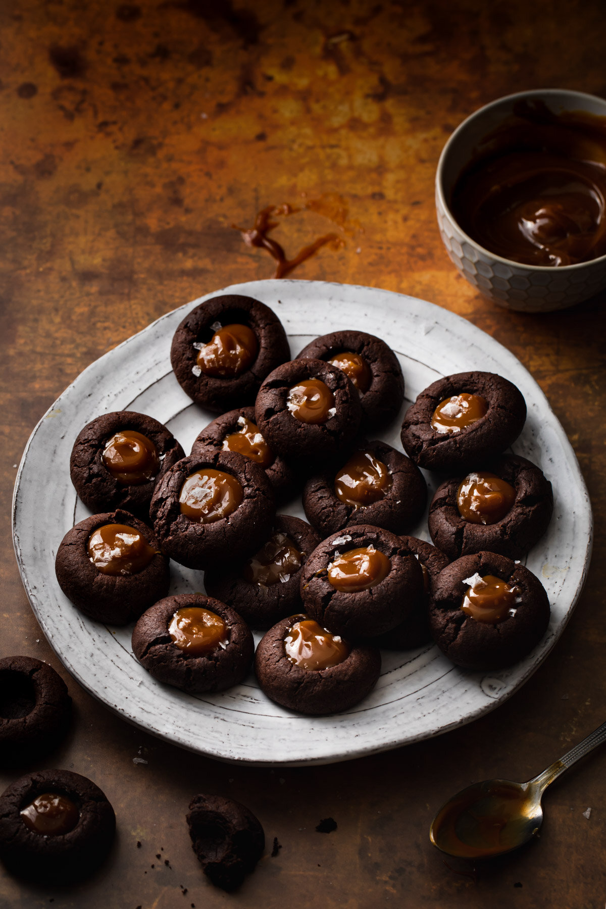Gingerbread Chocolate Thumbprint Cookies with Dulce de leche and flaky salt