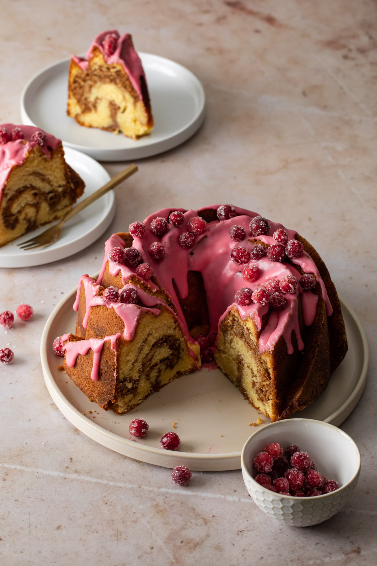 Cinnamon Swirl Bundt Cake with sugared cranberries
