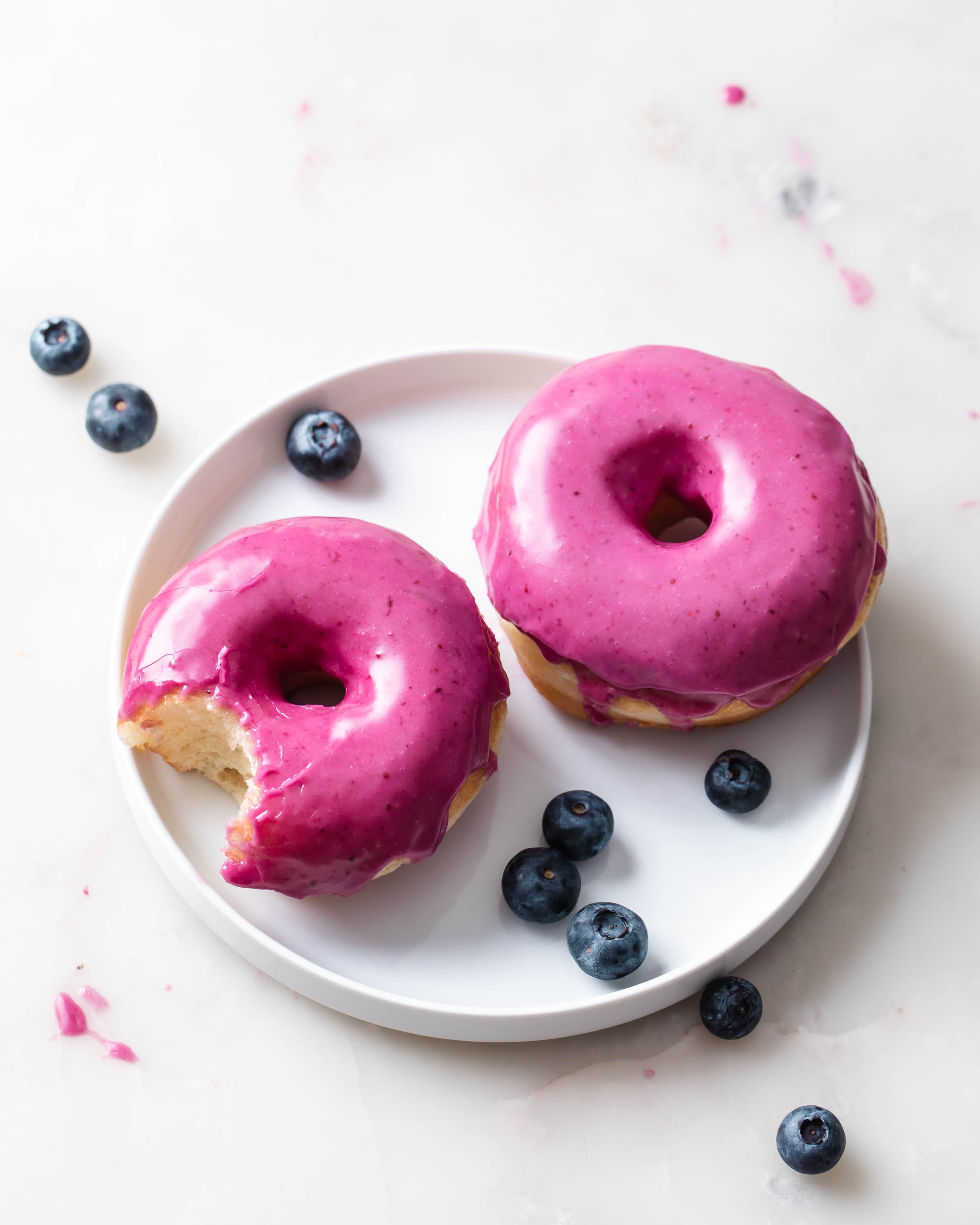Blueberry glazed brioche donuts