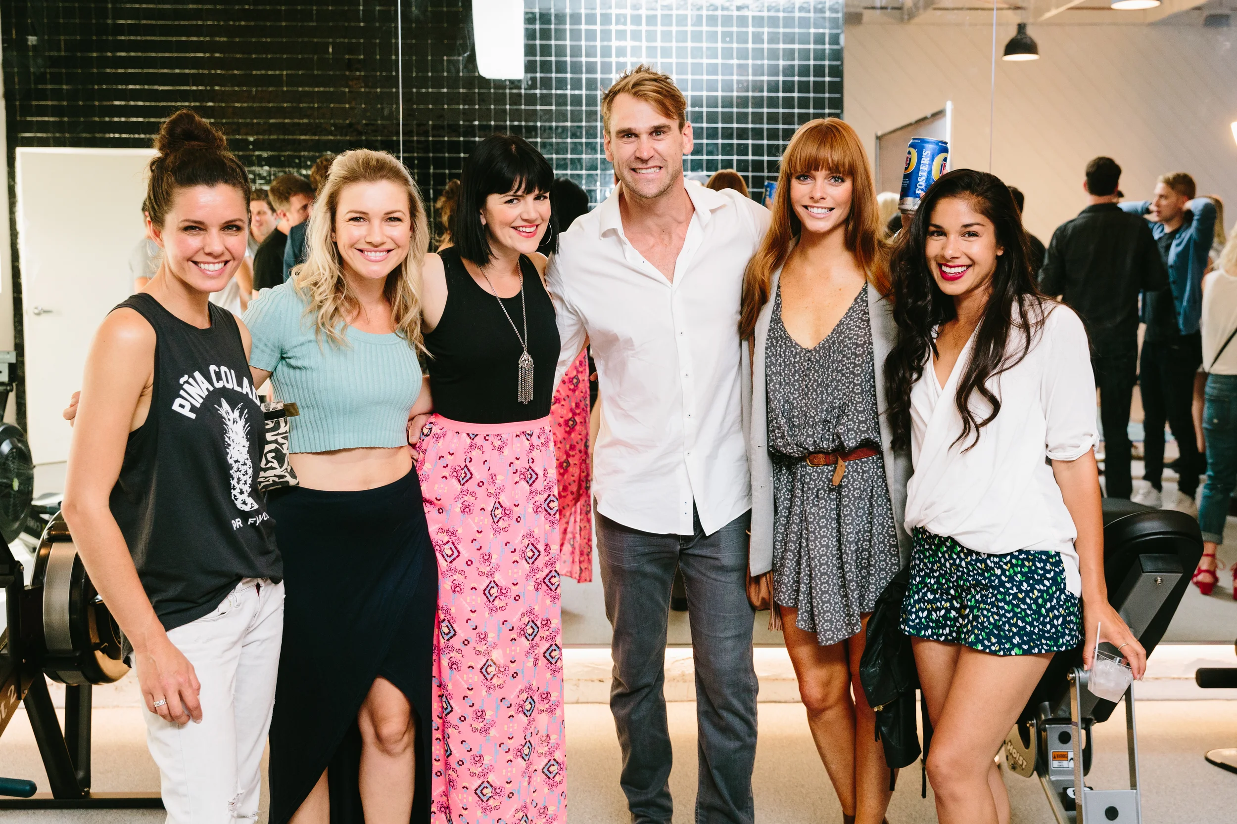 Luke Milton along with Chloe Hurst (on Luke's left) and other guests