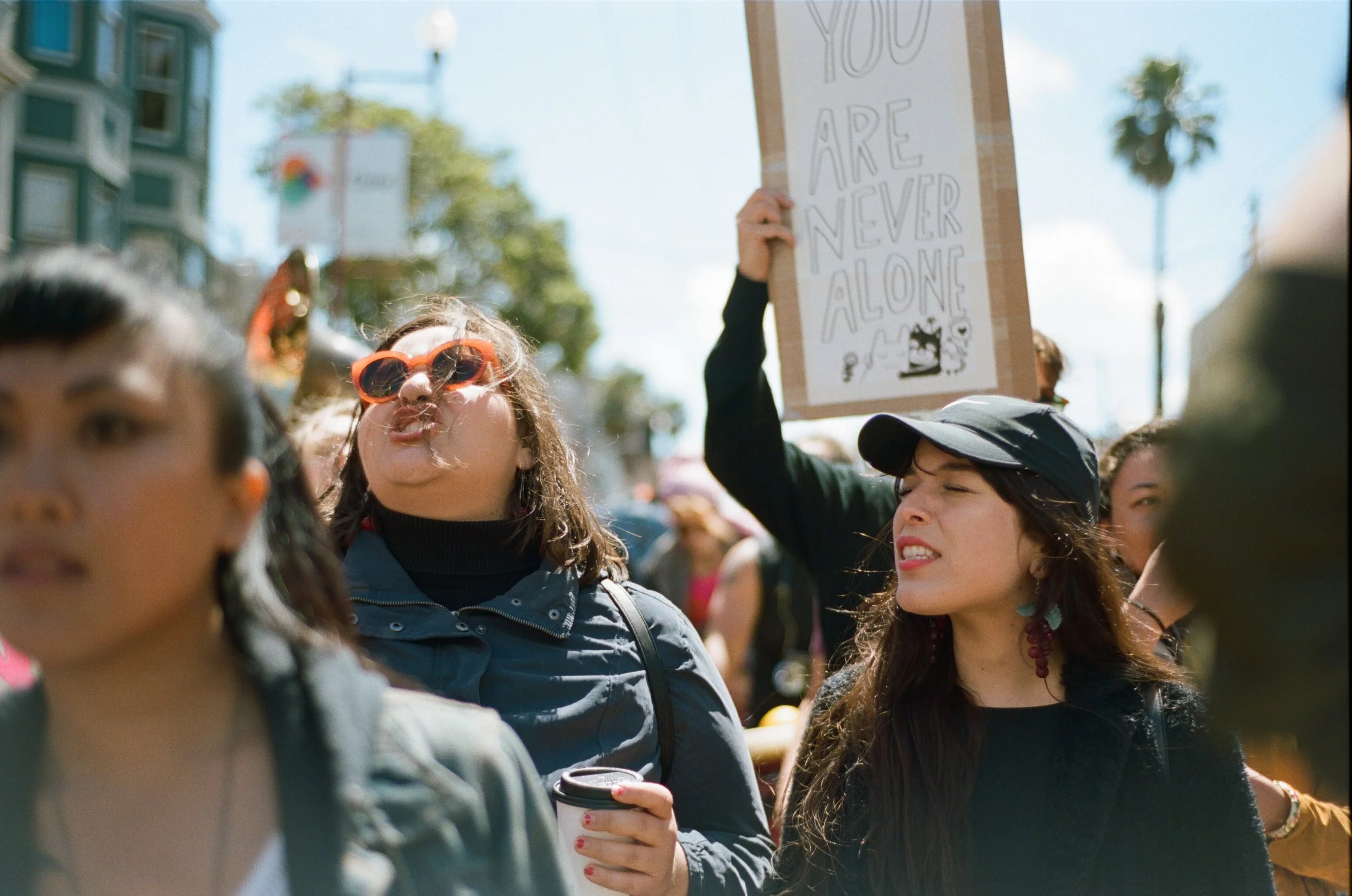 (L-R) Alma Reyes and Crystal Millán protest at the Walk Against Rape in San Franciscio's Mission District. (2017)