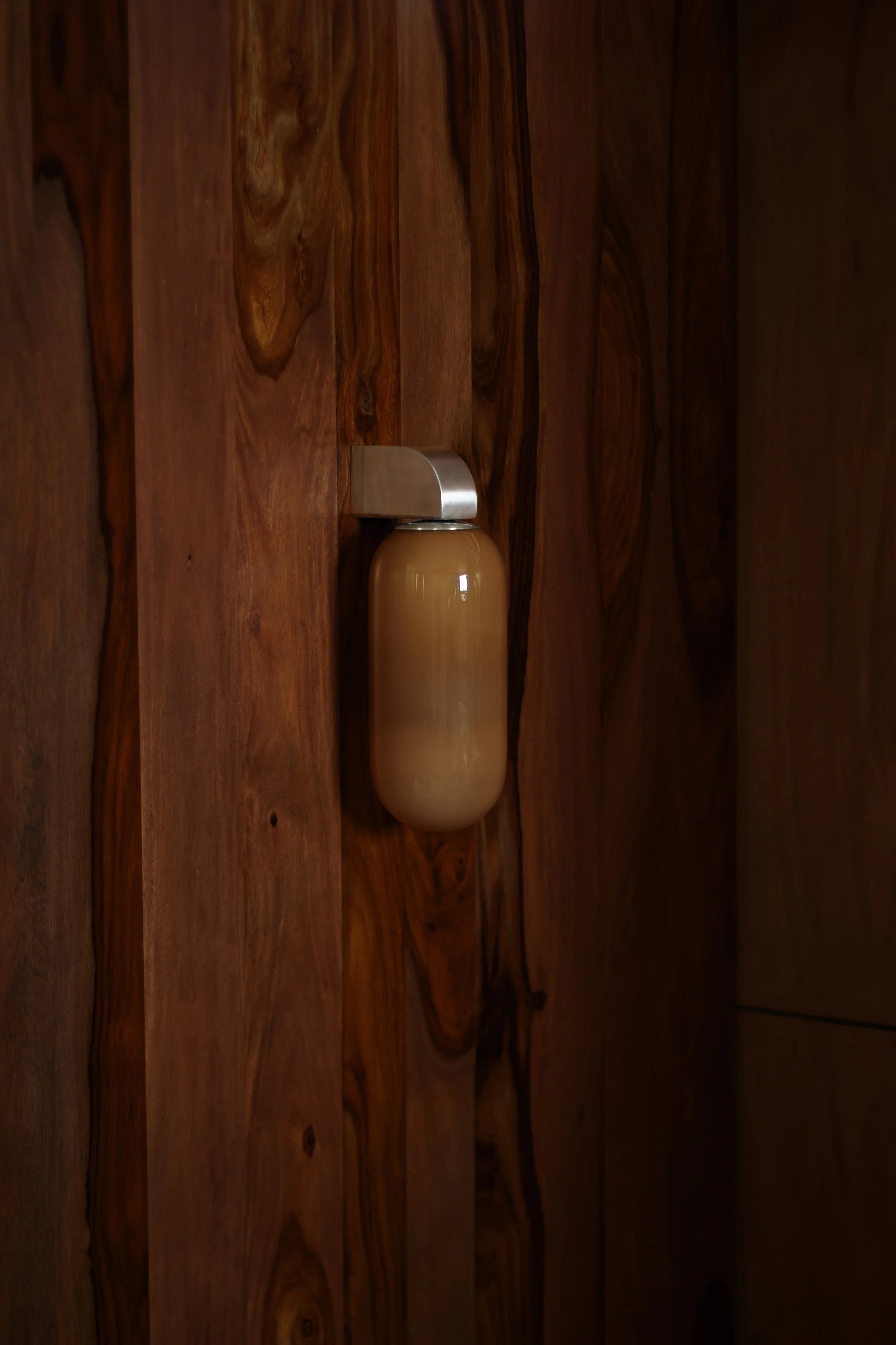 Capsule Wall Walnut Wood SS Off.jpg