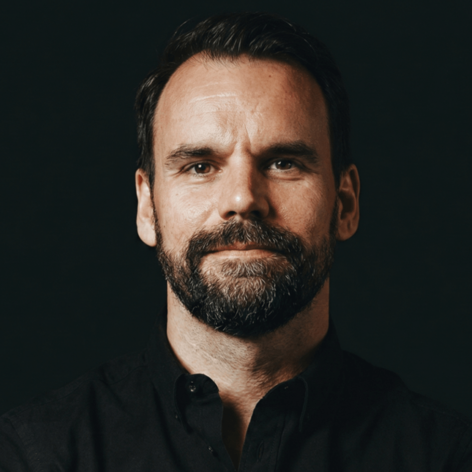 Portrait of Adam Dittrich, founder of the AdamOne AI transformation studio