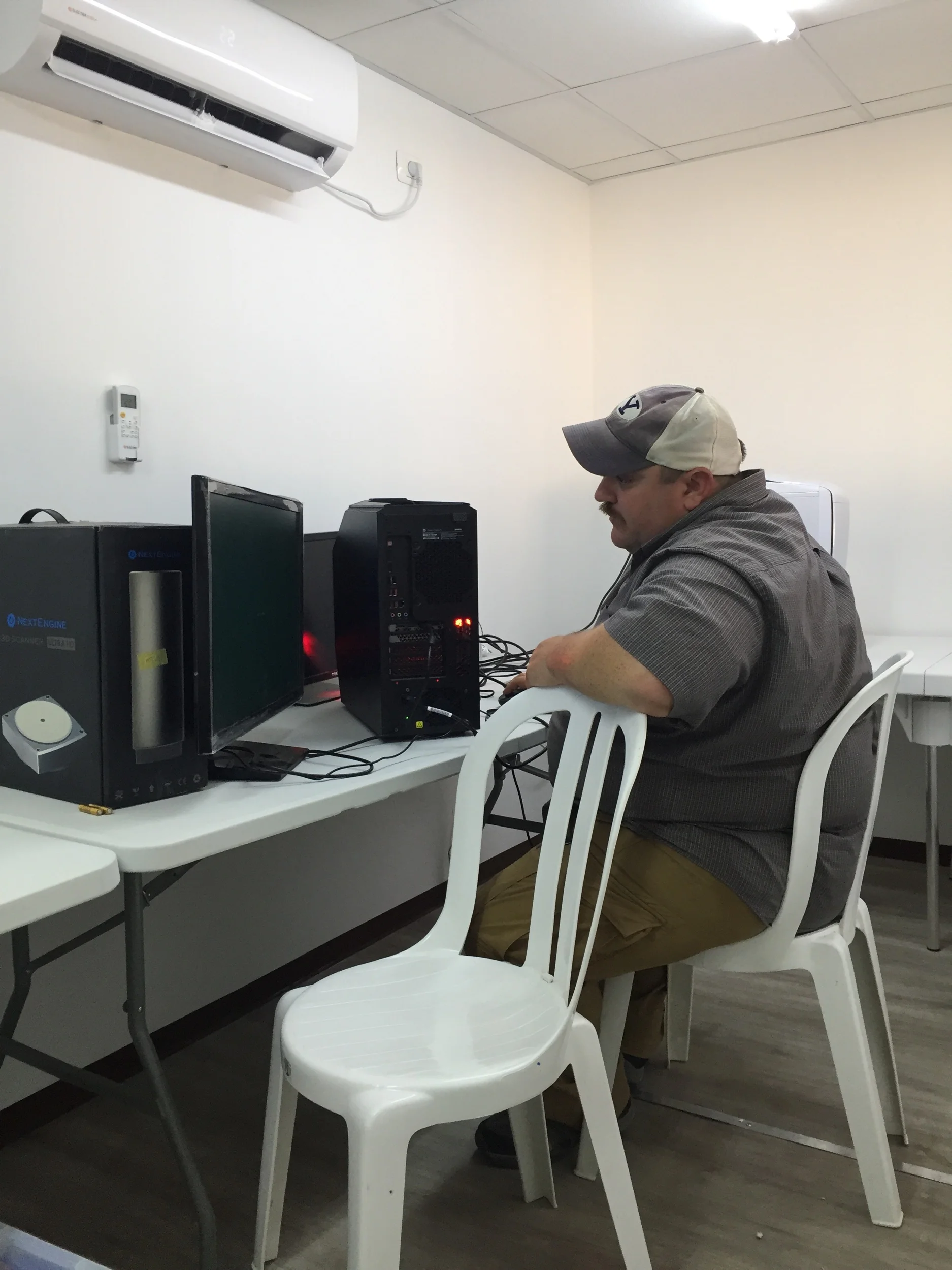 Dr. George Pierce setting up the GIS computers