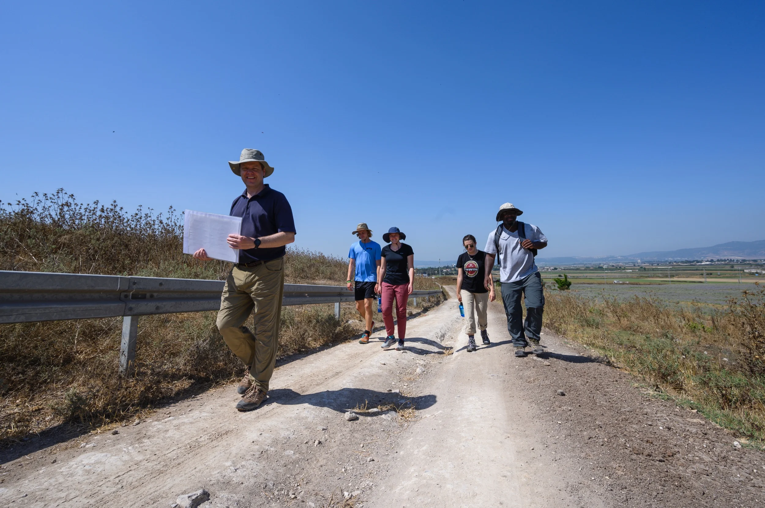 Co-Director Daniel Master leads a tour of the site