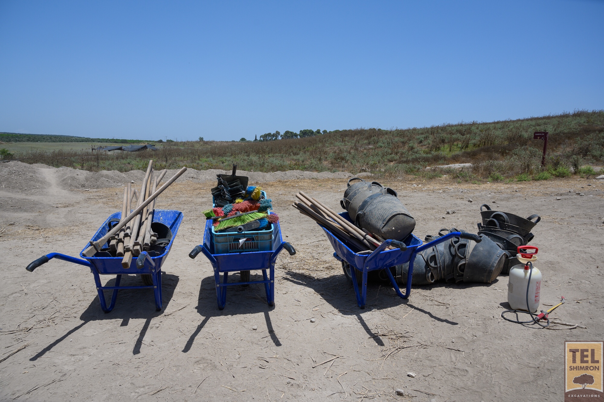 Wheelbarrows waiting to go back to the pottery compound