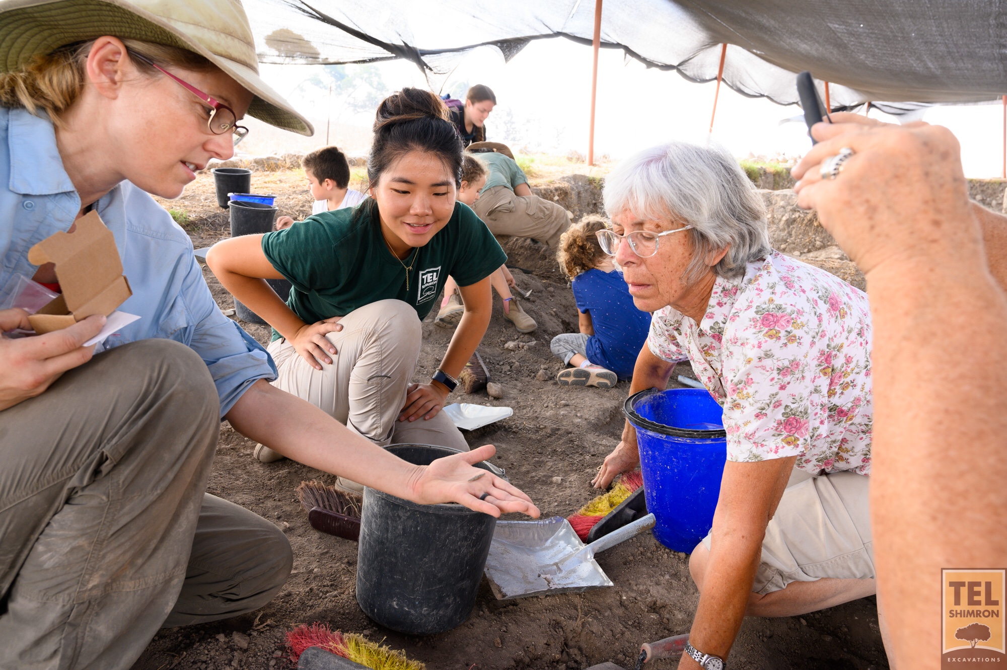 Dr. Kate Birney explains an artifact to our visitors