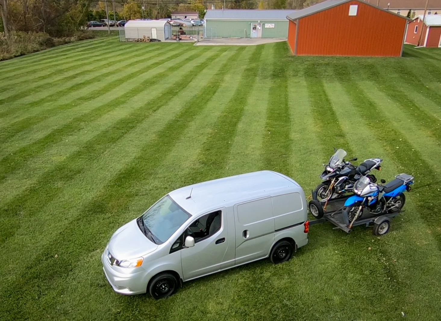 KLR and GS loaded up behind the NV200.