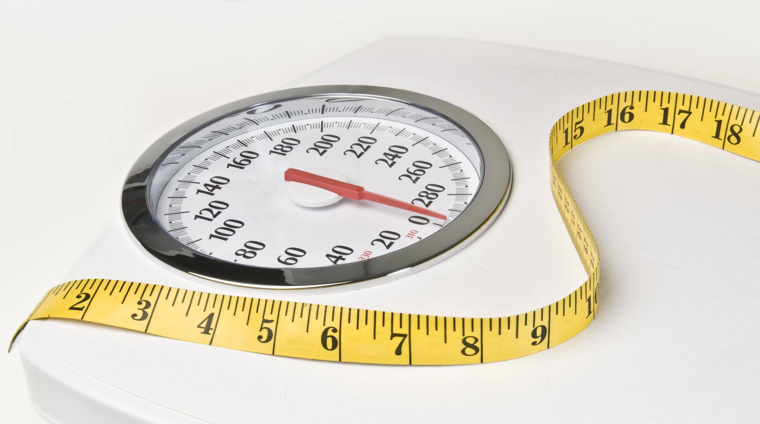 Scale and measuring tape - integrated medicine Tucson
